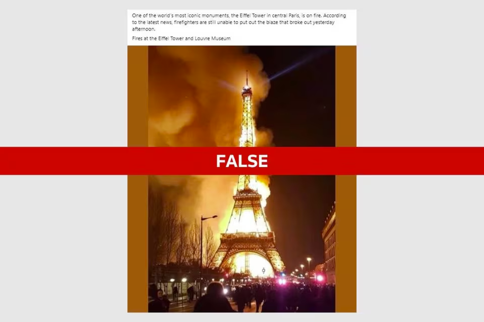 The image shows the Eiffel Tower at night with a vibrant orange glow at its base and middle sections, resembling flames. A smoky haze is visible around the tower's top. In the foreground, onlookers are gathered, and emergency vehicle lights are visible. Overlaid on the image is a large red banner with the word "FALSE" in white letters, indicating that the depiction of the Eiffel Tower on fire is not accurate. This is likely from a fact-checking context to clarify misinformation.